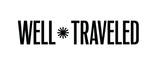 Well Traveled Club logo